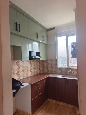 Kitchen in 3 BHK Apartment at Amrapali Golf Homes, Sector 4 Greater Noida – for Rent