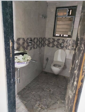 Bathroom in 2 BHK Apartment at Harshail Flamingo Apartments, Malad West – for Rent
