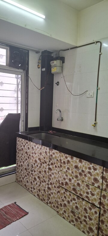 Kitchen in 2 BHK Apartment at Sai Ashish CHS, Ghansoli – for Rent