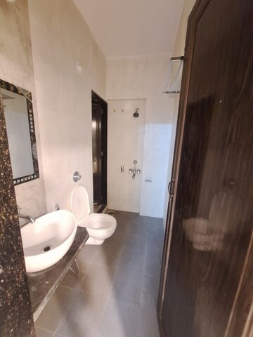 Bathroom in 1 BHK Apartment at Vihang Valley Phase 3, Kasarvadavali – for Rent