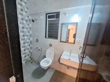 Bathroom in 1 BHK Apartment at Vihang Valley Phase 3, Kasarvadavali – for Rent