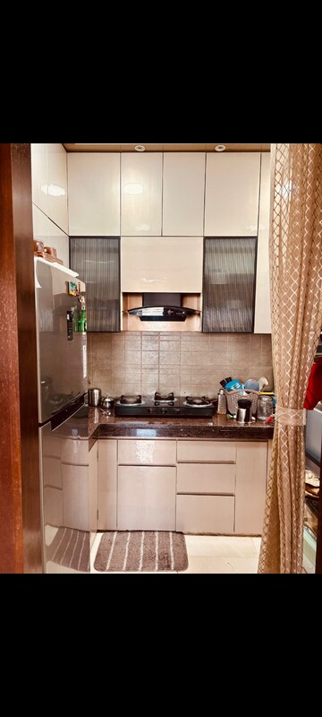 Kitchen in 2 BHK Apartment at Ace Divino, Sector 1 Greater Noida – for Rent