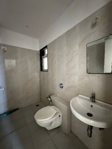 Bathroom in 2 BHK Apartment at Puranik Hometown, Ghodbunder Road – for Rent