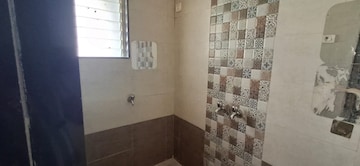 Bathroom in 1 BHK Apartment at Raunak Unnathi Greens, Kasarvadavali – for Rent