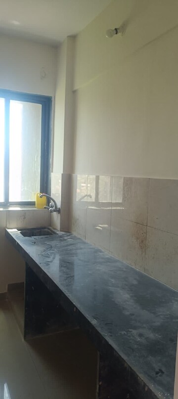 Kitchen in 1 BHK Apartment at Vantage Green Woods, Shilphata – for Rent