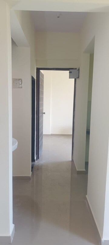 Building Lobby in 1 BHK Apartment at Vantage Green Woods, Shilphata – for Rent