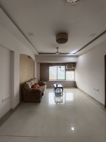 Living Room in 3 BHK Apartment at Gold Mist, Vile Parle West – for Rent