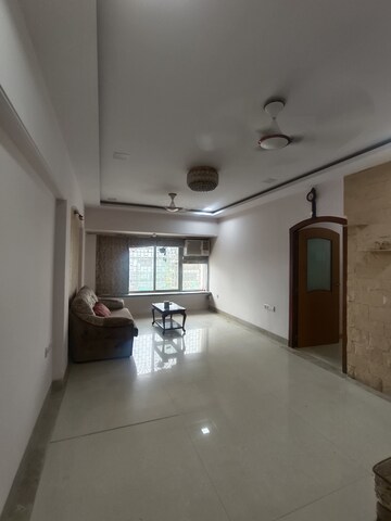 Living Room in 3 BHK Apartment at Gold Mist, Vile Parle West – for Rent