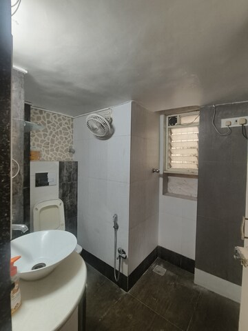 Bathroom in 3 BHK Apartment at Gold Mist, Vile Parle West – for Rent