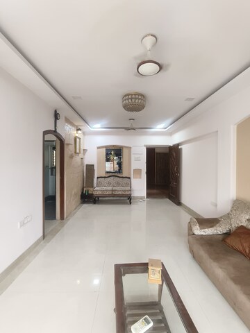 Living Room in 3 BHK Apartment at Gold Mist, Vile Parle West – for Rent