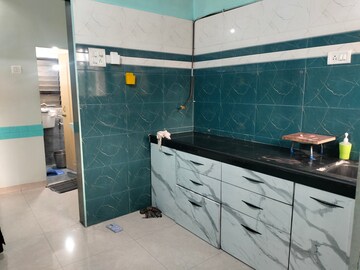 Kitchen in 1 BHK Apartment at Sai Baba Vihar Complex, Ghodbunder Road – for Rent