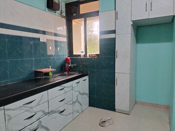 Kitchen in 1 BHK Apartment at Sai Baba Vihar Complex, Ghodbunder Road – for Rent