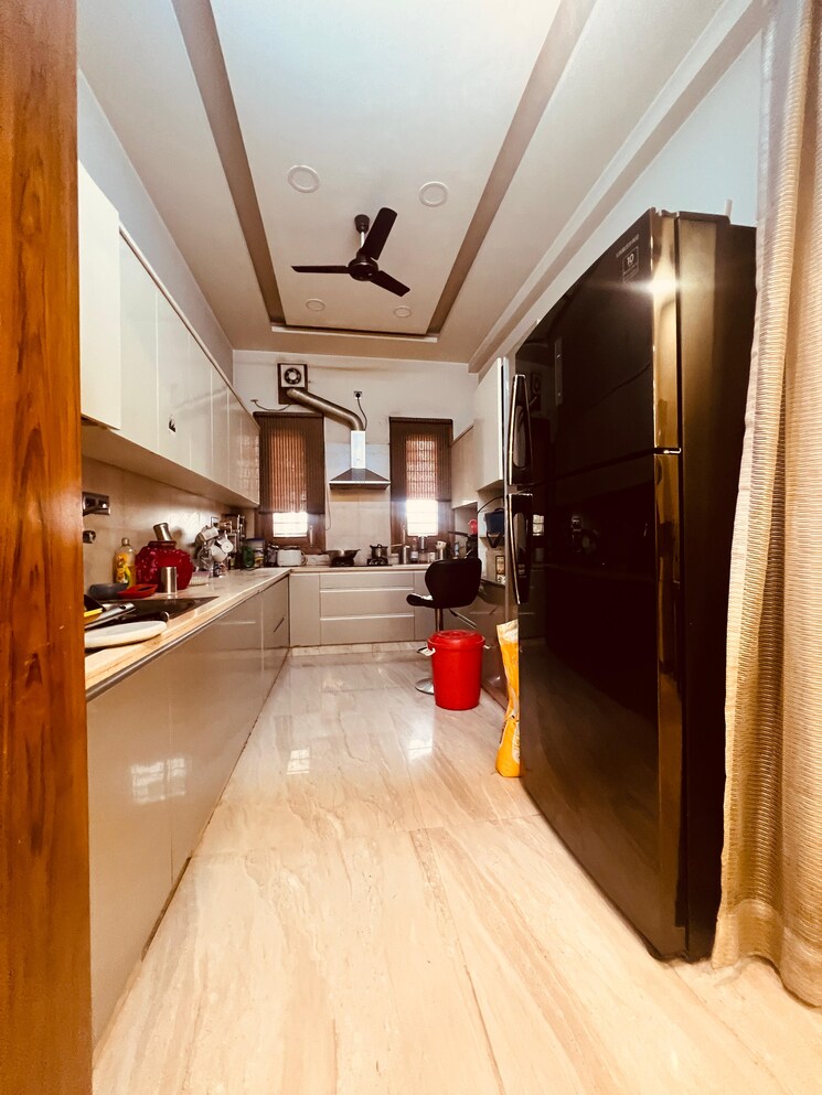 Kitchen, central-park-ii-bellevue 3 Bedroom 2400 Sq.Ft. Apartment In Sector 48 Gurgaon 8858874