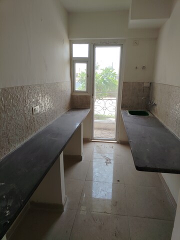 Kitchen in 2 BHK Apartment at Signature The Millennia 2, Sector 37d – for Rent