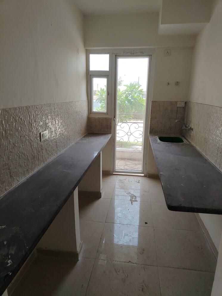 Kitchen, signature-the-millennia-2 2 Bedroom 686 Sq.Ft. Apartment In Sector 37d Gurgaon 8858889