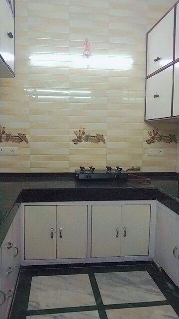 Kitchen in 2 BHK Builder Floor at South Extension ii – for Rent