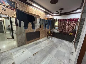 Living Room in 1 BHK Apartment at River Park Complex, Dahisar East – for Sale