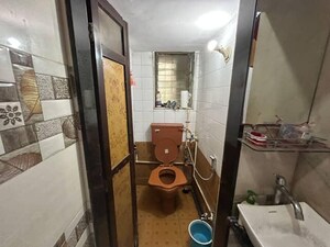 Attached Bathroom in 1 BHK Apartment at River Park Complex, Dahisar East – for Sale