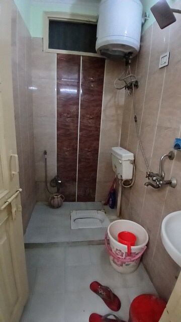 Bathroom in 3 BHK Apartment at Zakir Nagar – for Sale