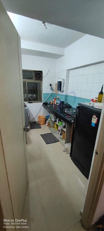 Kitchen in 2 BHK Apartment at Neelkanth Greens, Manpada – for Rent