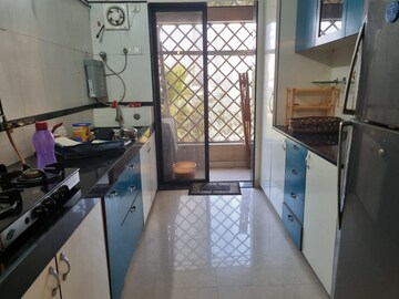 Kitchen in 3 BHK Apartment at Shikhar Kunj Malad, Malad East – for Rent