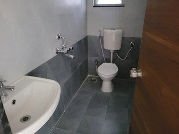 Bathroom in 4 BHK Apartment at Dharmesh Apartment, Shivajinagar – for Rent