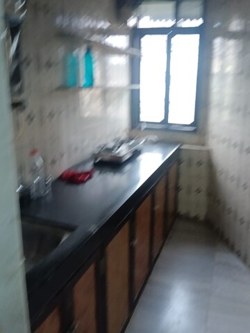 Kitchen in 1 BHK Apartment at Mahesh Nagar CHS, Goregaon West – for Rent