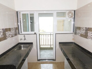 Kitchen in 2 BHK Apartment at Gsa Grandeur, Malad East – for Sale