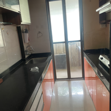 Kitchen in 2 BHK Apartment at Sun Residency Pune, Hinjewadi – for Rent