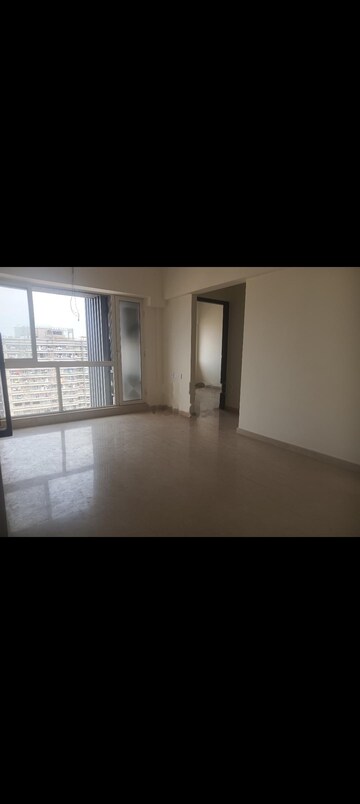 Room in 2 BHK Apartment at Omkar Signet, Malad East – for Rent