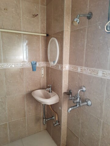 Bathroom in 2 BHK Apartment at HDIL Dheeraj Residency, Goregaon West – for Rent