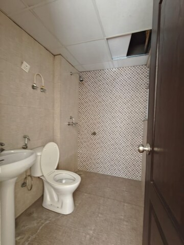 Bathroom in 2 BHK Apartment at Aditya City Apartments, Shahpur Bamheta – for Rent