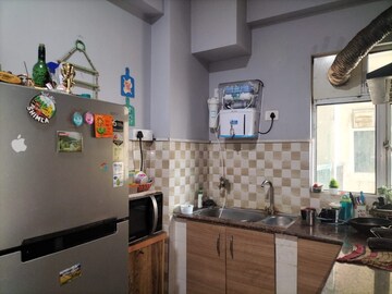 Kitchen in 3 BHK Apartment at Mahagun Mywoods, Sector 16c Greater Noida – for Rent