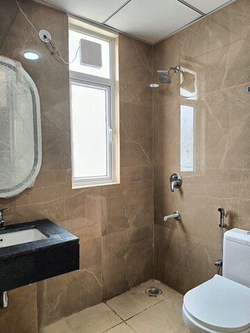Bathroom in 3 BHK Builder Floor at Smart World Gems, Sector 89 – for Sale