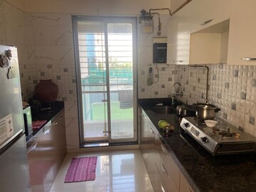 Kitchen in 2.5 BHK Apartment at Dinsha Orchid, Ulwe Sector 9 – for Rent