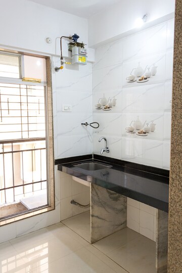 Kitchen in 1 BHK Apartment at Pragati Crystal, Ulwe Sector 21 – for Sale