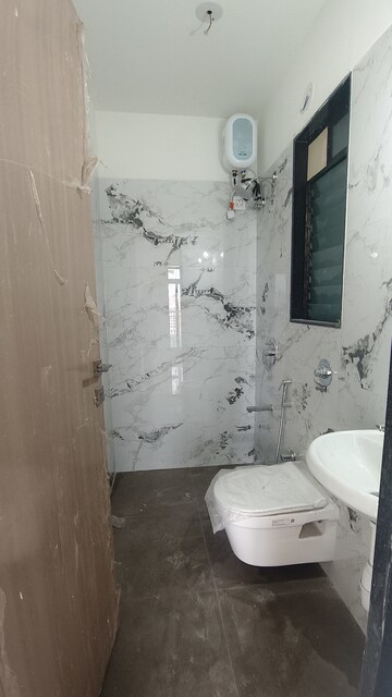 Bathroom in 1 BHK Apartment at Oxford Navrang Crystal, Goregaon West – for Rent