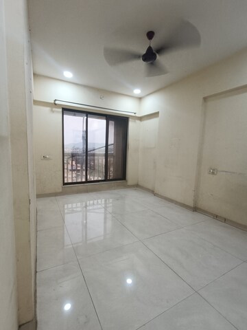 Living Room in 1 BHK Apartment at Salasar Aarpan, Mira Road – for Rent