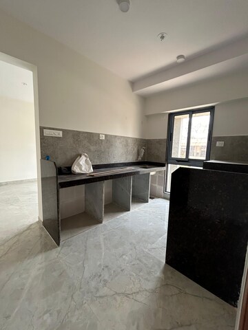 Kitchen in 1 BHK Apartment at Ajmera Boulevard, Malad West – for Sale