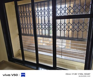 Room in 2 BHK Apartment at Lalani Residency, Kavesar – for Sale