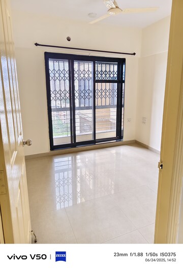 Room in 2 BHK Apartment at Lalani Residency, Kavesar – for Sale