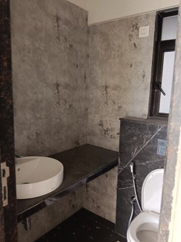 Bathroom in 2 BHK Apartment at Ajmera Arham, Malad West – for Rent