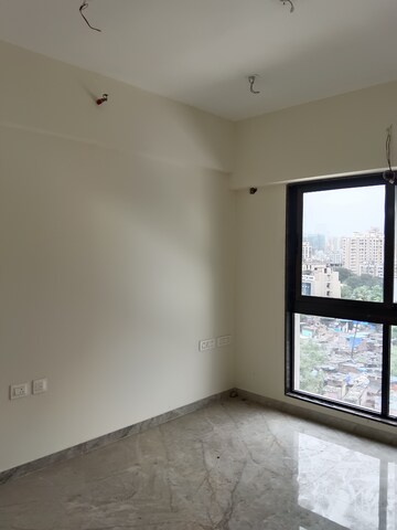 Room in 2 BHK Apartment at Ajmera Arham, Malad West – for Rent