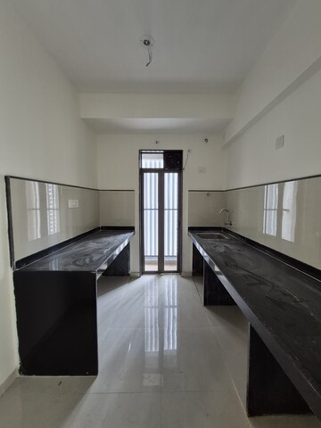 Kitchen in 1.5 BHK Apartment at Runwal My City Phase II Cluster 05, Dombivli East – for Rent