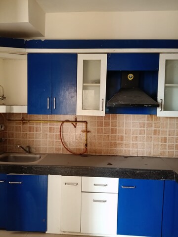 Kitchen in 3 BHK Apartment at Mahagun Mywoods II, Sector 16c Greater Noida – for Rent