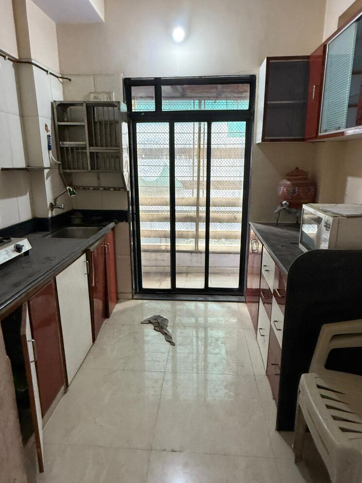 Kitchen, space-ashley-garden 1 Bedroom 500 Sq.Ft. Apartment In Mira Road Thane 8861997
