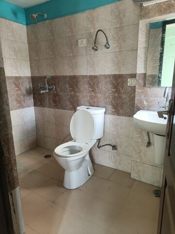 Bathroom in 2 BHK Apartment at Amrapali Golf Homes, Sector 4 Greater Noida – for Rent