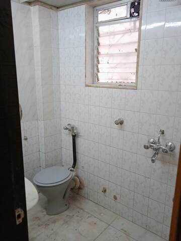 Bathroom in 2 BHK Apartment at Vashveen Apartments, Andheri West – for Rent