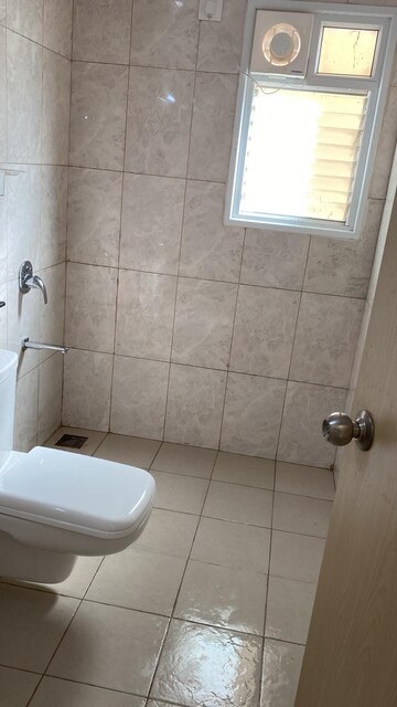 Bathroom in 3 BHK Apartment at Mantri Webcity, Hennur – for Rent