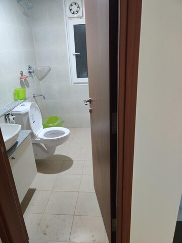 Bathroom in 2.5 BHK Apartment at Bhartiya Nikoo Homes Phase 2, Thanisandra Main Road – for Rent